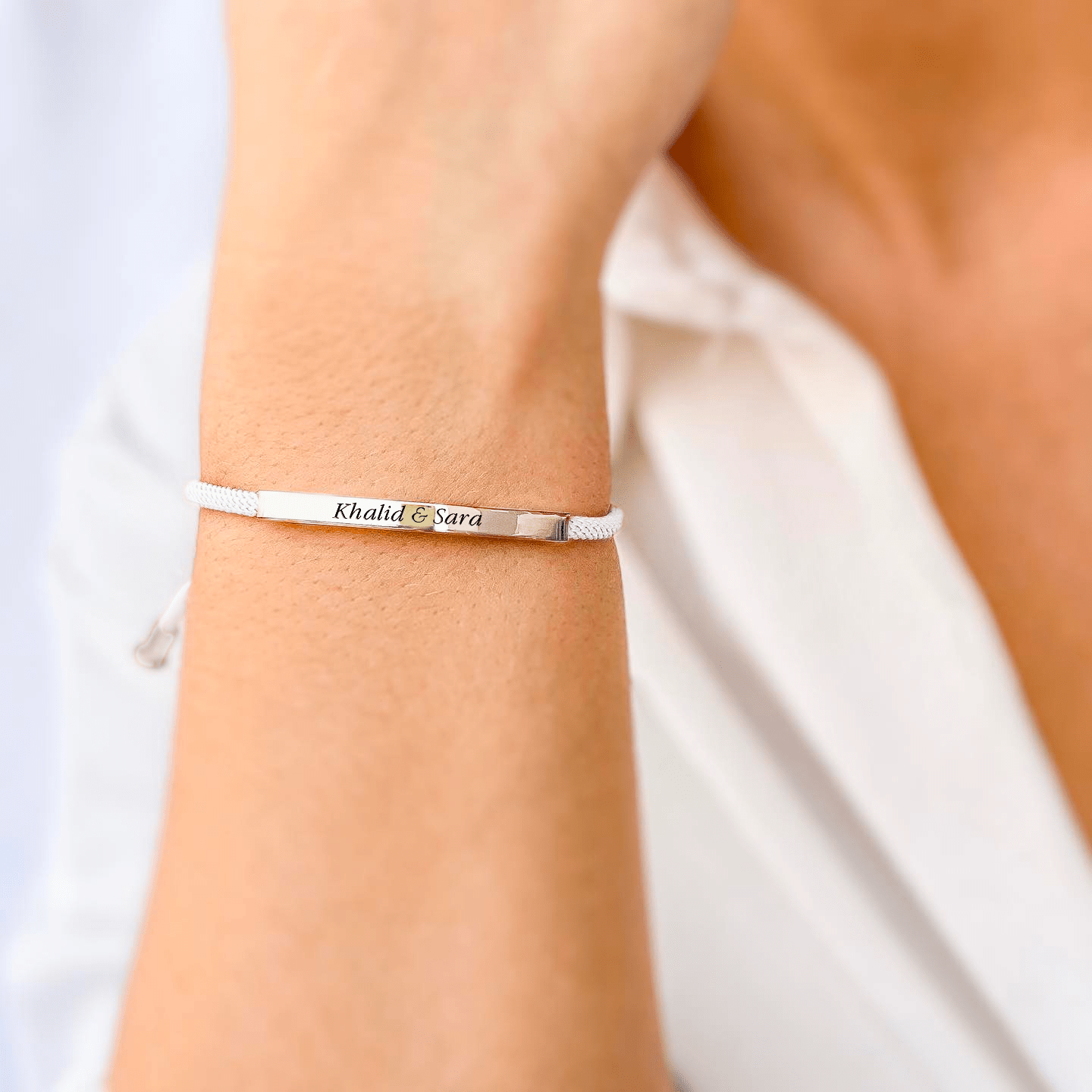 Promesse Bracelet in Silver, White Feather - Roro Arabia -