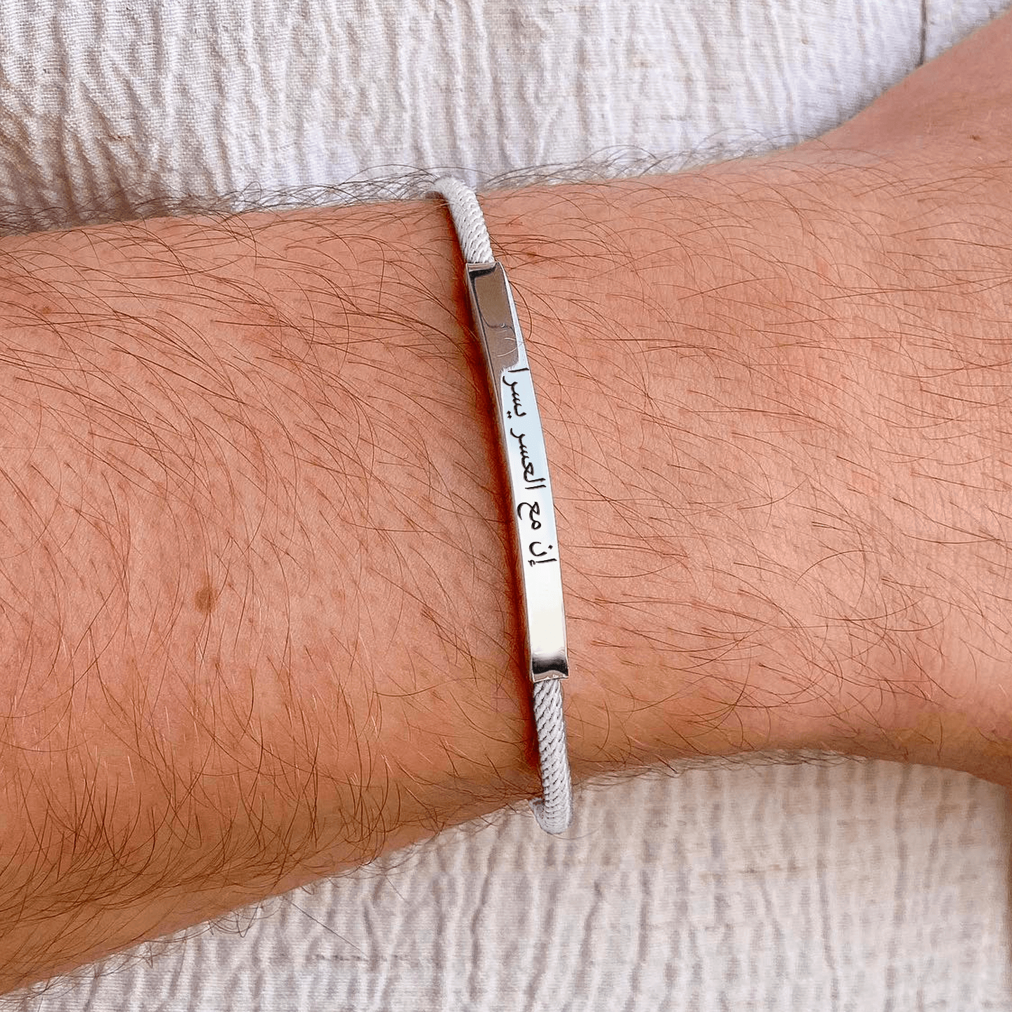 Promesse Bracelet in Silver, White Feather - Roro Arabia -